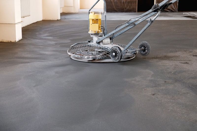 concrete floor polishing with machine trowel