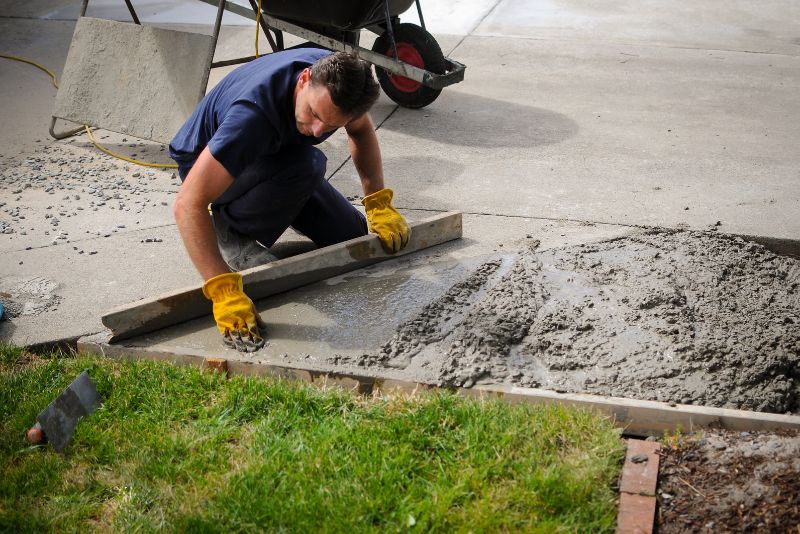 man repairing the driveway