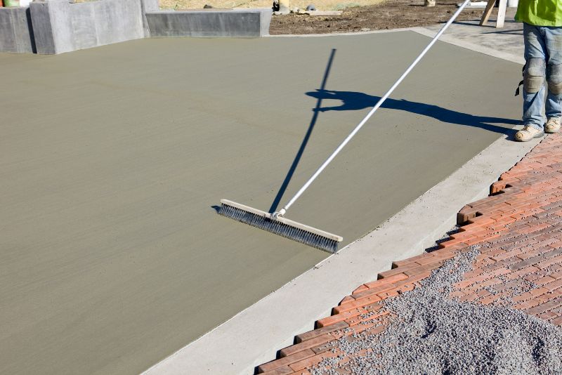 Smooth grey concrete finish on a driveway surface