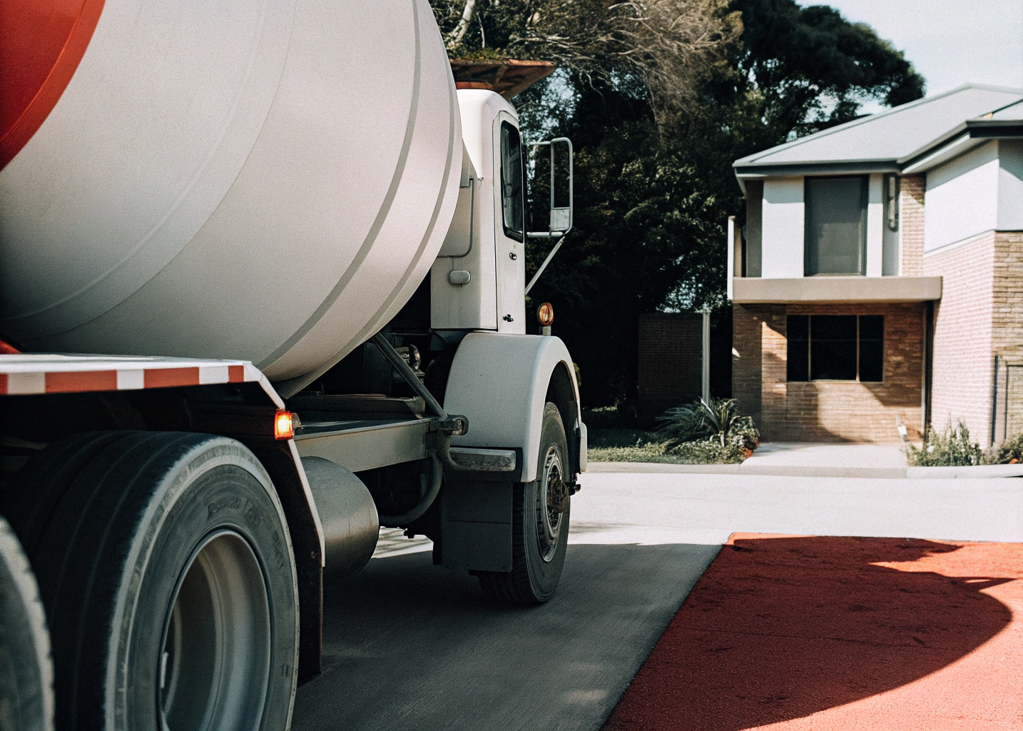 Concrete agitator truck parked on a suburban Ipswich street