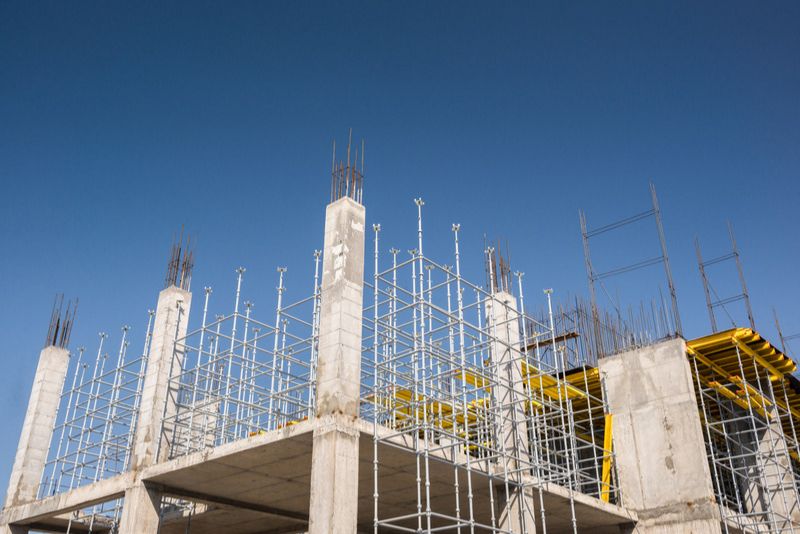 Concrete columns and scaffolding at a multi-storey building under construction